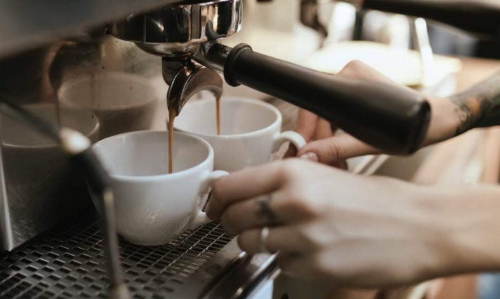 hands making coffee