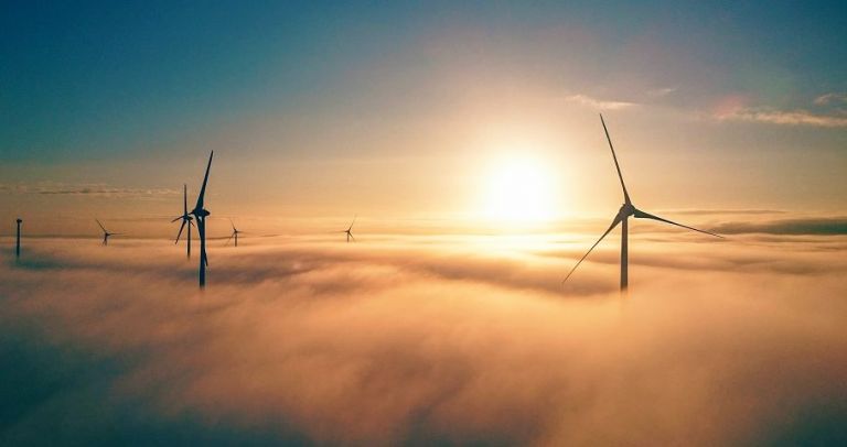 wind farm above the clouds