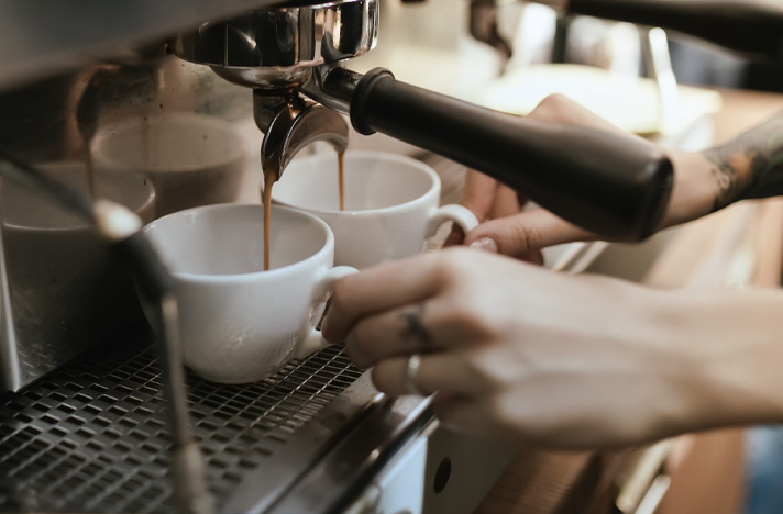 hands making coffee