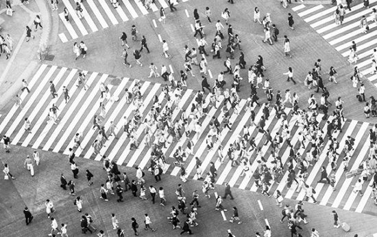 People crossing the street, black and white photo