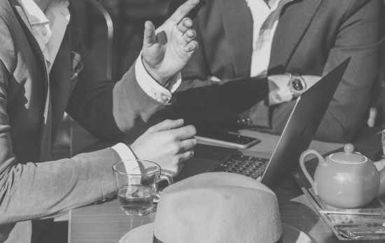 Hands and laptop in black and white photo