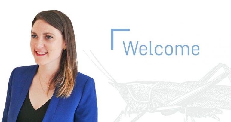 Rebecca Craddock Taylor and a "welcome" sign