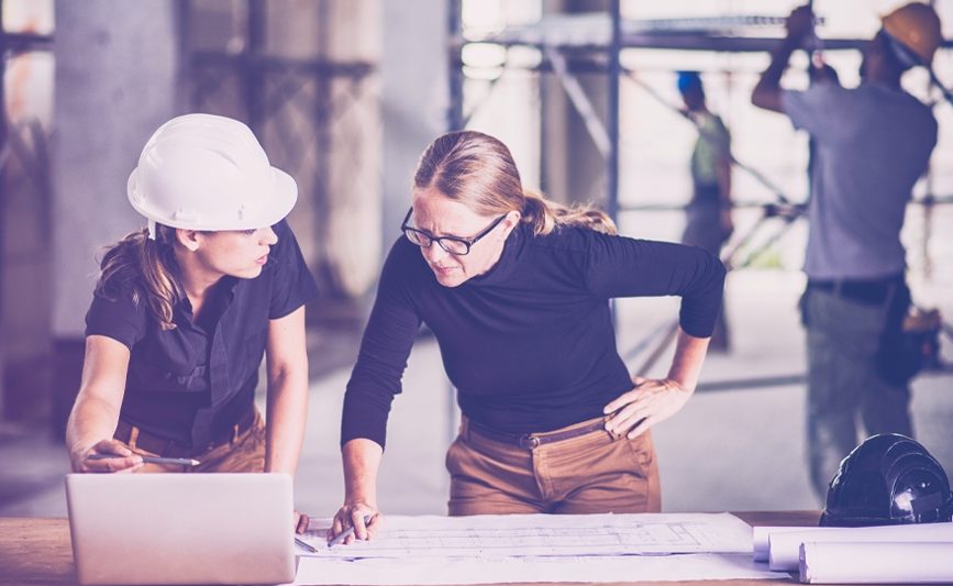 Two women at the construction site