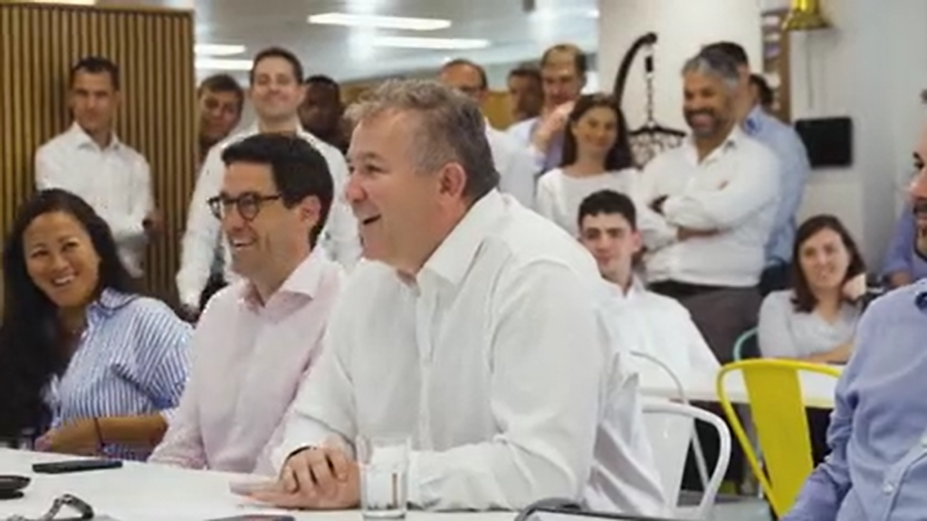 People in the room smiling