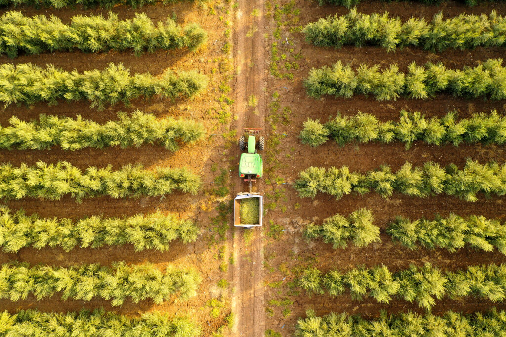 Image of tractor on farm, natural capital, agriculture