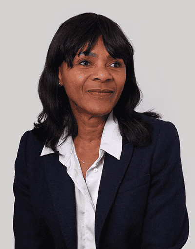 Sophisticated businesswoman in formal attire representing Gresham House investment management services.